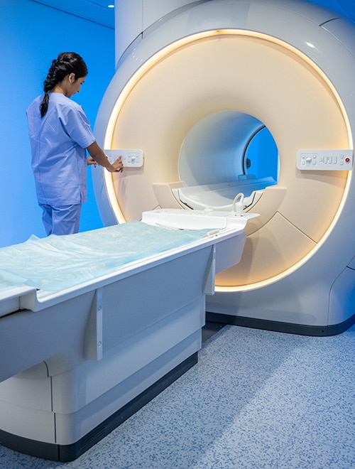 Doctor preparing PET/CT scan machine